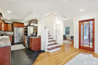 Back door off kitchen opens to back deck and yard.