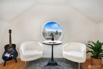 Center round window almost makes it feel like a ship. The view is delightful!