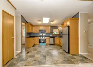 Kitche is spacious with lots of storage and counter space