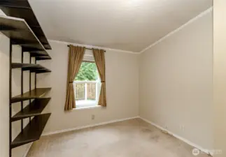 Open concept office den behind the kitcchen in the hallway to the other bedrooms