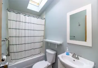 Full bathroom in the hallway for guests and near the other bedrooms