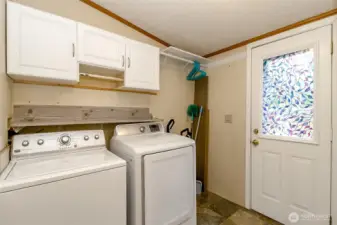 Door to the back deck off of the utility room