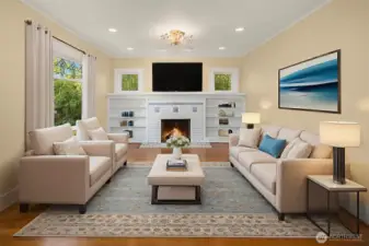 Enter into a large living room with leaded glass windows, built ins and woodburning fireplace