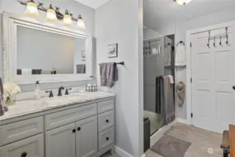 Newly remodeled bathroom is luxurious and functional.