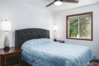 Each bedroom is freshly painted, has new vinyl plank flooring and a ceiling fan.