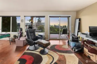 Living Room showing 2 windows & sliding door to deck