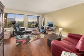 Living Room with windows to deck and views