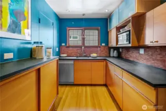 Lower cabinets by Henrybuilt (includes corner cabinet sliding shelf unit.) Fronts are clear vertical grain Douglas-fir.