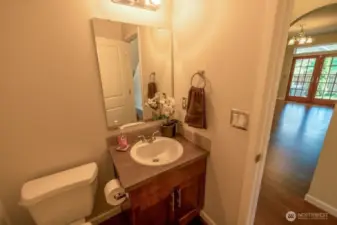 Conveniently located main-floor powder room.