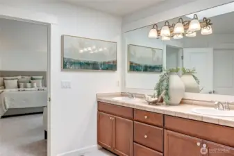With its generous layout, soft lighting, and soothing finishes, this bathroom is the perfect blend of comfort and sophistication.