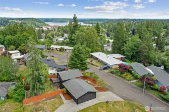 Massive corner lot with peek a boo view of the water from the living room and back deck