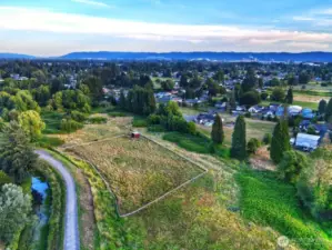 Horse fence is not the property line, it continues to edge of photo
