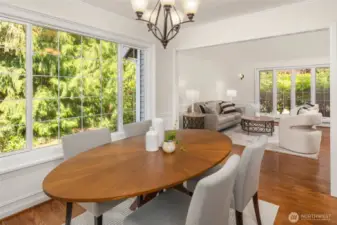 Formal dining with buffet on the opposite wall of the window.