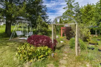 VICTORIAN SWING AND GAZEBO IN BACKGROUND