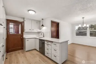 New quarts counters and backsplash.