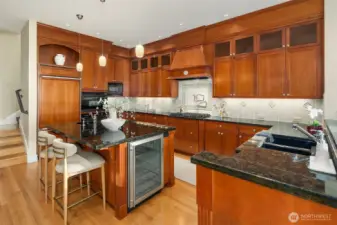 Looking SE to Kitchen with all the features a discriminating homeowner desires. Double oven and two disposals too.