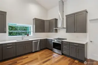 Ktichen: light-filled and spacious, vaulted ceilings, overhead fan.