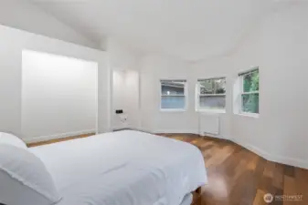 Second Bedroom:  Small nook for possible home office desk. Extra tall closet space with additional storage space above. Light in closet area.