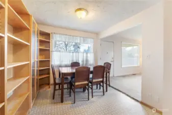 Lots of shelving in dining area off kitchen