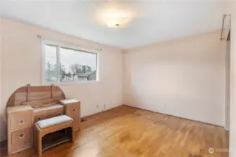 Primary bedroom with original hardwoods