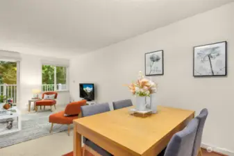 Open dining room with cherry hardwood floors.