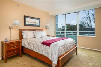 Spacious bedroom with another territorial view deck