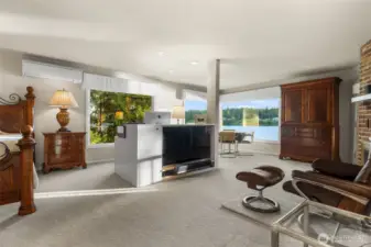 Huge primary on main fireplace and corner window hidden area
