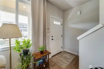 Though the home has 2 entrances, this is the one by the garage.. often seen as the "front" of the home.
