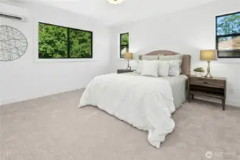 Enter the main-level Primary en suite bedroom/bath and huge walk in closet.