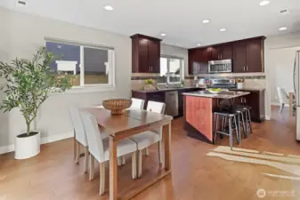 Everyday dining area perfectly situated between living room& Kitchen