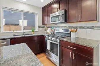 Kitchen with stainless steel gas stove