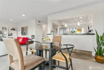 Dining area, but don't miss the counter space with room for bar stools