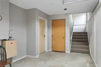 Access to the garage and stairs up to your unit