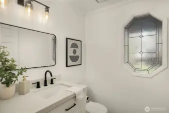 Powder room on main is beautifully updated