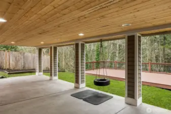 Lower deck plus covered patio for year-round entertaining and fun!