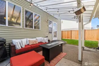 Covered exterior space is so valuable in the PNW, and this one offers room to relax, dine, and grill.