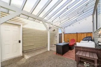 The door on the left side of the photo leads to the detached 2-car garage.