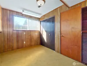 Lower level bedroom 5 with Murphy bed.