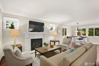 Warm and inviting living room with stately gas fireplace
