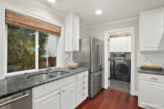 You will appreciate the walk-in pantry and utility room located conveniently in the kitchen