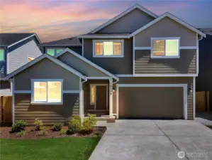 Photos are taken of a Shelby plan previously built in the community.