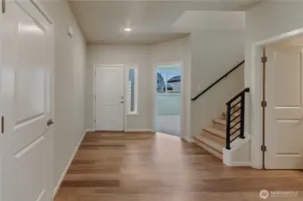 Photos are taken of a Shelby plan previously built in the community.