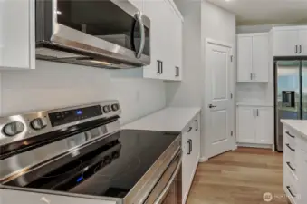 Photos are taken of a Shelby plan previously built in the community.