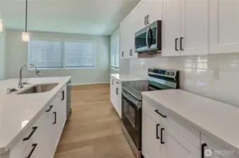 Photos are taken of a Shelby plan previously built in the community.