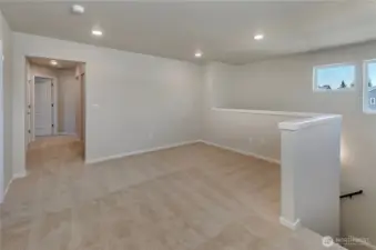 Photos are taken of a Shelby plan previously built in the community.