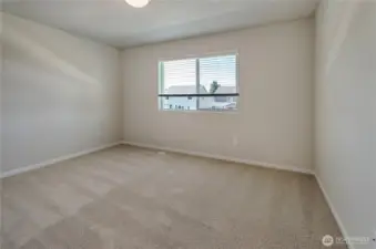 Photos are taken of a Shelby plan previously built in the community.