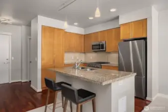 Newly updated appliances and thoughtful finishes make the kitchen both stylish and functional.