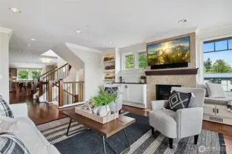 The kitchen, dining room, and living room seamlessly integrate, creating an ideal space for entertaining.