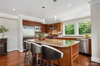 Wolf gas range, Viking refrigerator and microwave, Bosch dishwasher, slab granite counters...all top of the line, just like the rest of the home.