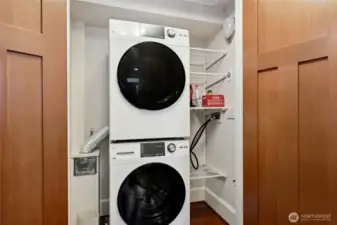 The laundry space is conveniently located on the bedroom level.